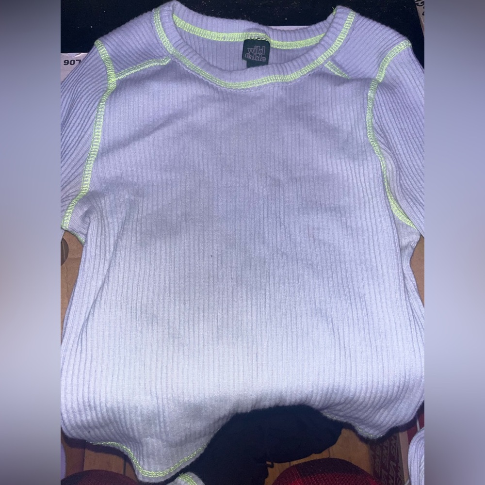 Blue and neon green long-sleeve top.